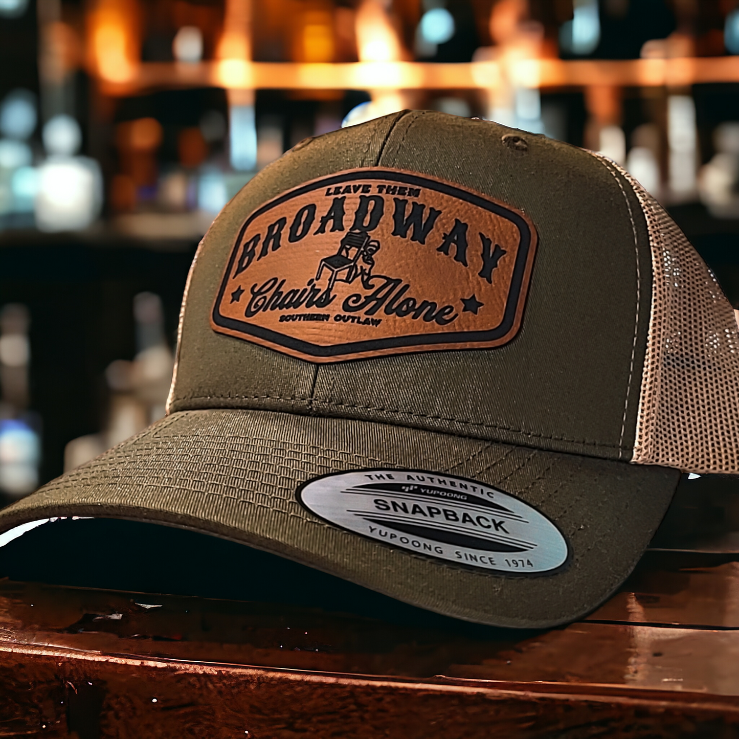 LEAVE THEM BROADWAY CHAIRS ALONE LEATHER TRUCKER HAT